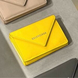 Brand new trifold wallet. Balenciaga Vibrant Yellow Envelope Wallet